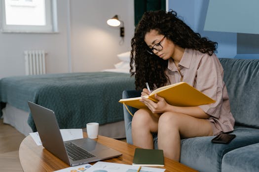 person journaling in a cozy space