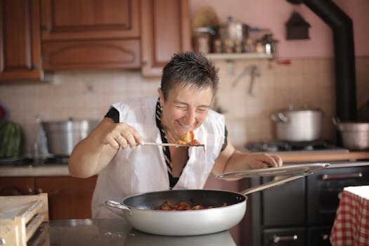 A cozy kitchen with a pot of vegetable soup on the stove