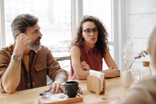 A small group of friends enjoying a cozy coffee chat