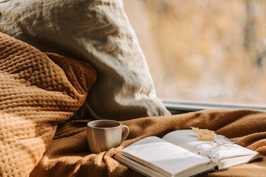 A cozy reading nook with soft blankets and pillows