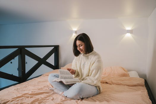 happy introvert reading a book in a cozy space